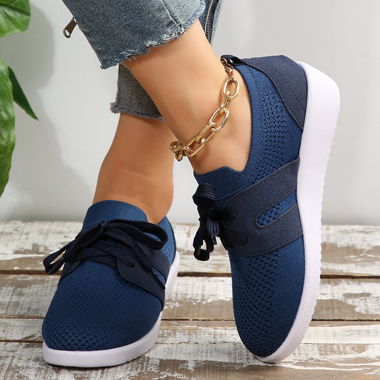 Lightweight knit sneaker with wide laces and flexible sole