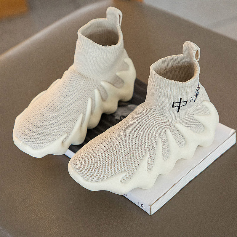 Sock-style sneaker with sculpted sole and breathable knit upper
