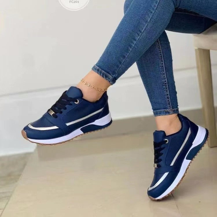 Lightweight everyday sneaker with smooth upper and cushioned insole
