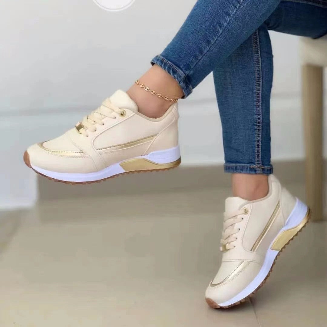 Lightweight everyday sneaker with smooth upper and cushioned insole