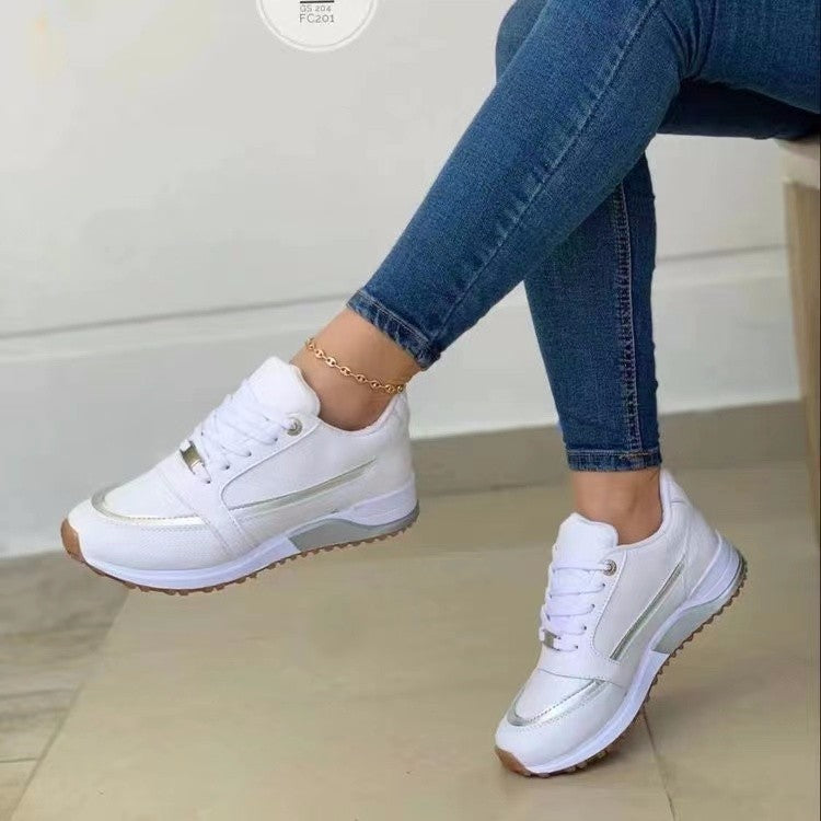 Lightweight everyday sneaker with smooth upper and cushioned insole
